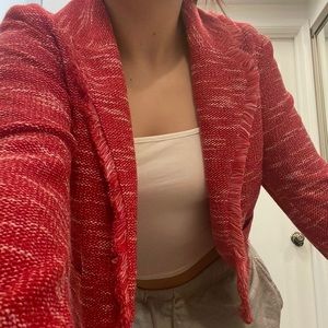 This beautiful strawberry colored blazer is so cute. It’s never been worn sadly.